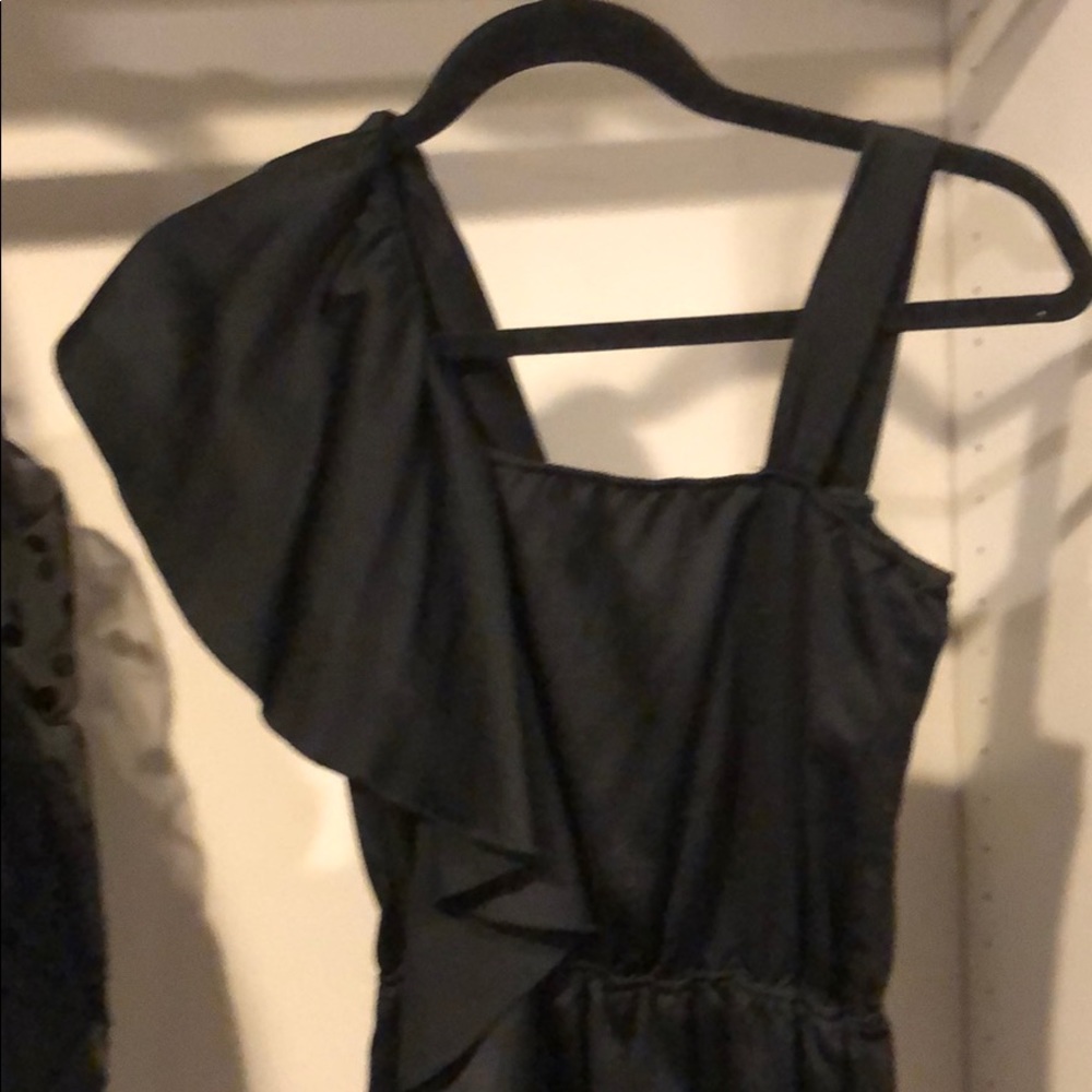 Black asymmetrical dress.